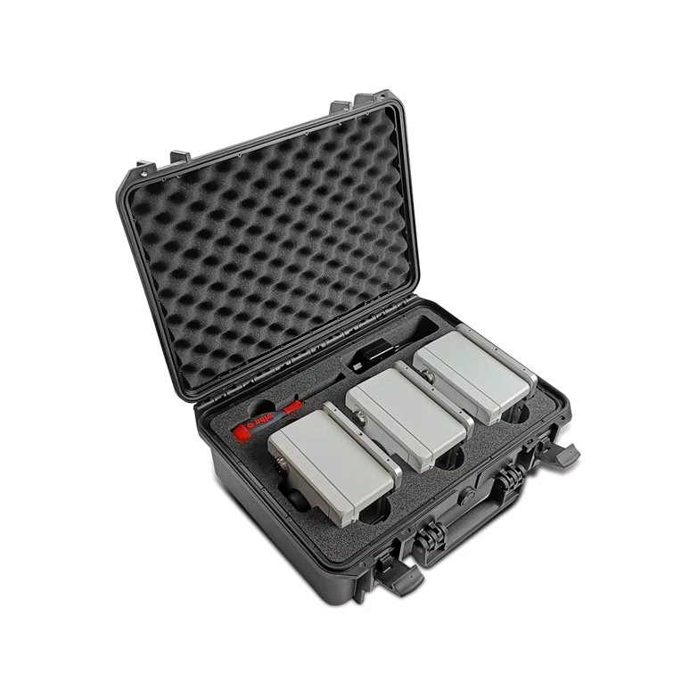 Black hard-shell protective case with foam interior holding electronic devices on a white background