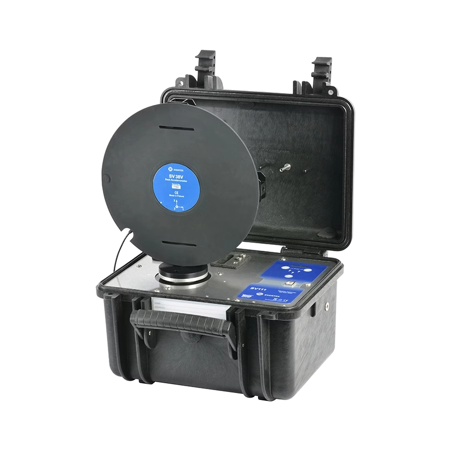 Black Svantek SV 111 Portable Vibration Calibrator with blue display inside a black carrying case on a white background